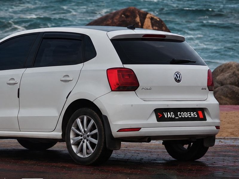 White VW Polo 2015 by the sea in Kanyakumari